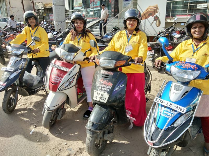 Girls driving outlet scooty